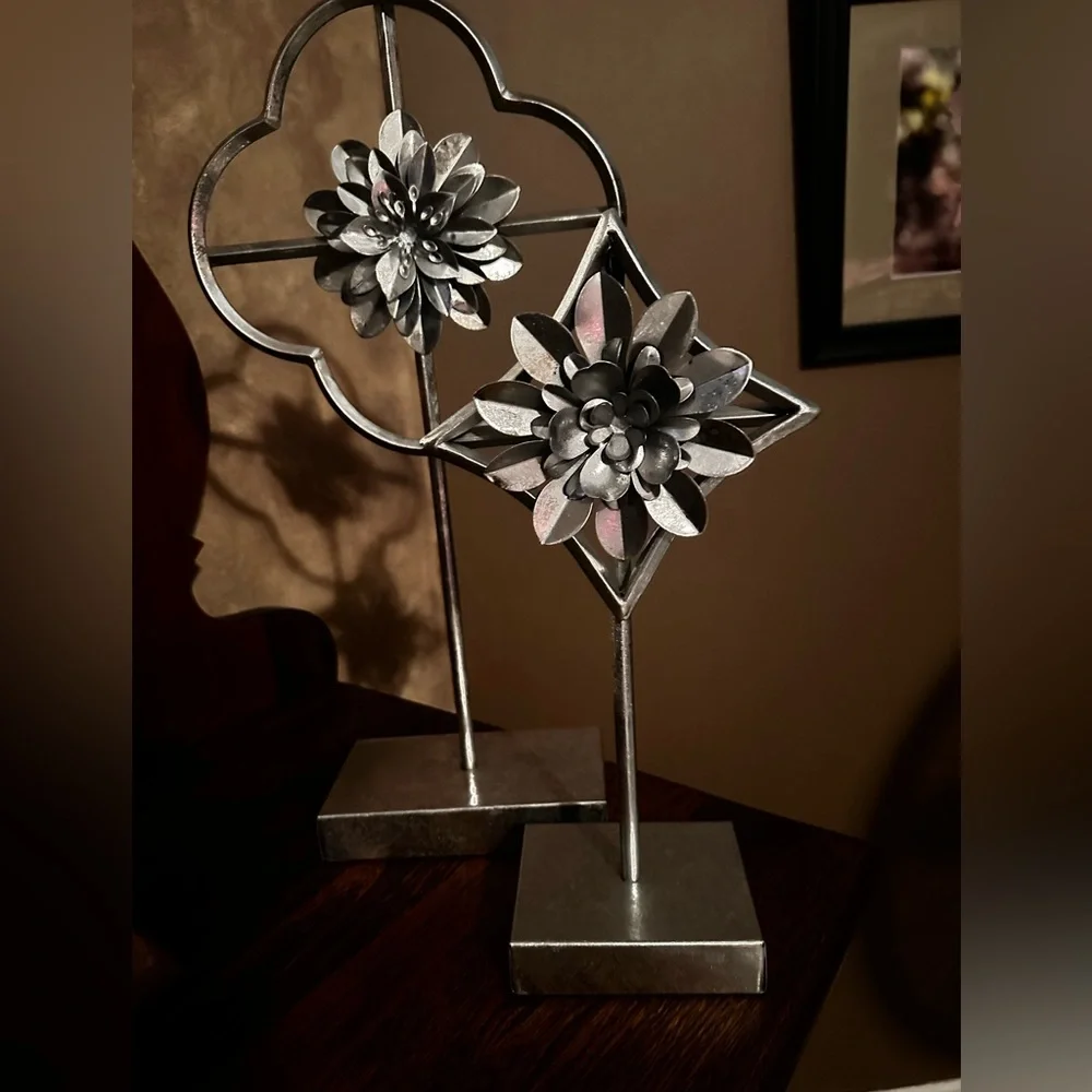 Home decor accents  two silver flowers on pedestal stand